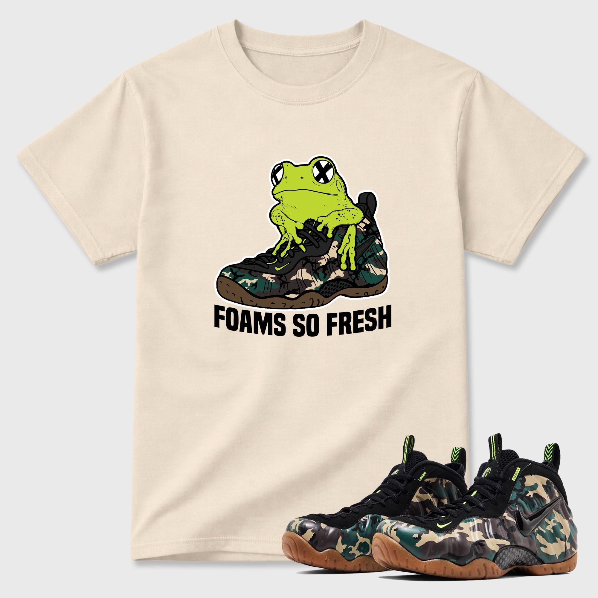 Foams So Fresh Graphic T-Shirt featuring original streetwear artwork designed to match the Air Foamposite Pro Green Camo. Natural 1 Graphic T-Shirt.