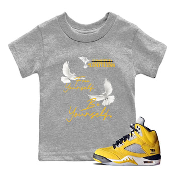 Free Yourself Be Yourself baby and kids t-shirt crafted for little sneakerheads to shine with the Air Jordan 5 Tokyo sneakers, displayed in Heather Grey 1.