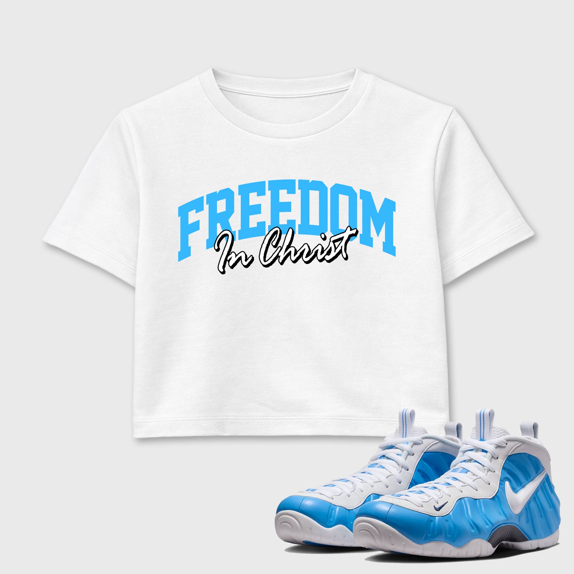 Best Sneakerfit Graphic Tee. Graphic Outfits. Sneaker Tees To Match Air Foamposite Pro University Blue Sneakers – Freedom In Christ Crop T-Shirt White 1