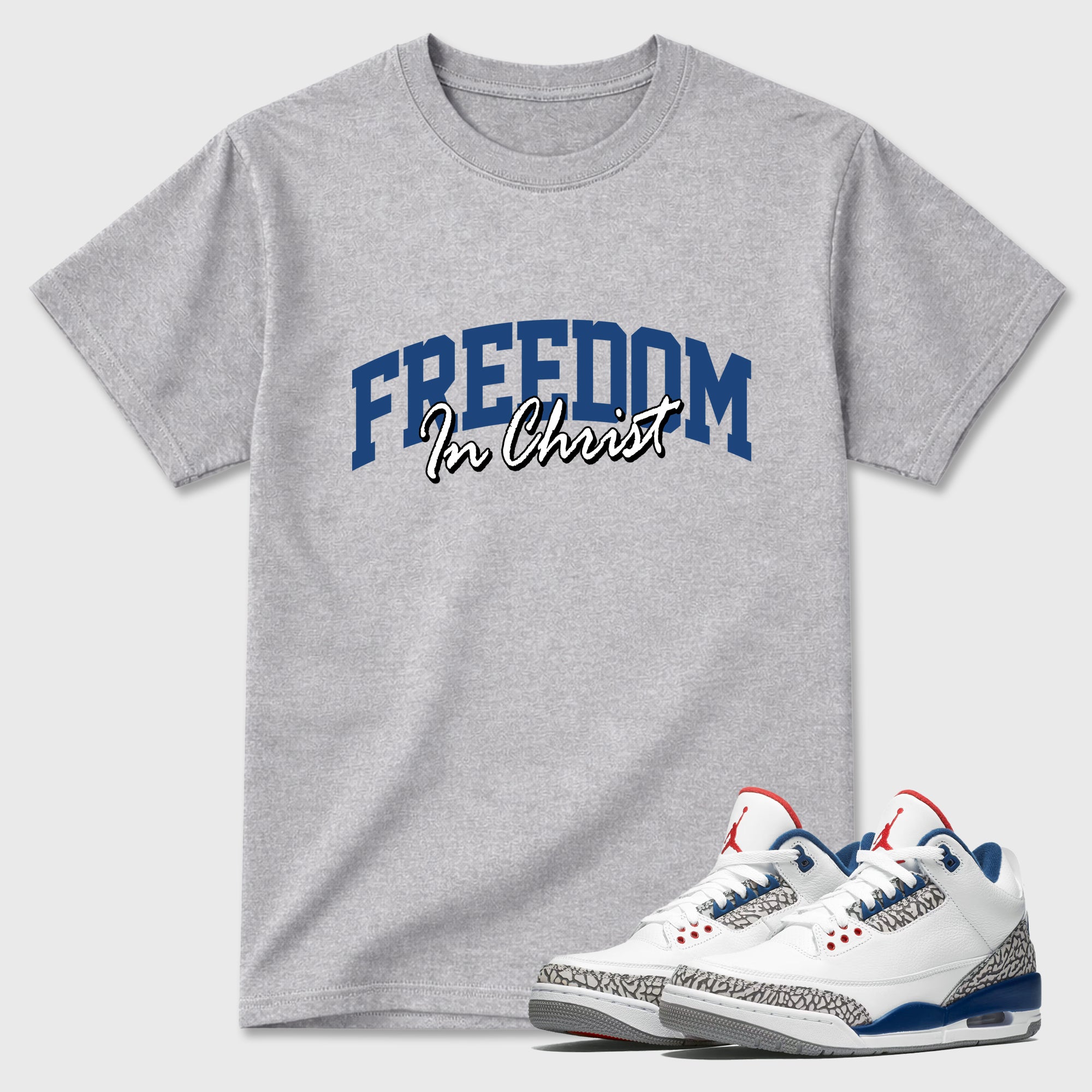 Freedom In Christ Graphic T-Shirt featuring original streetwear artwork designed to match the Air Jordan 3 True Blue. Heather Grey 1 Graphic T-Shirt.