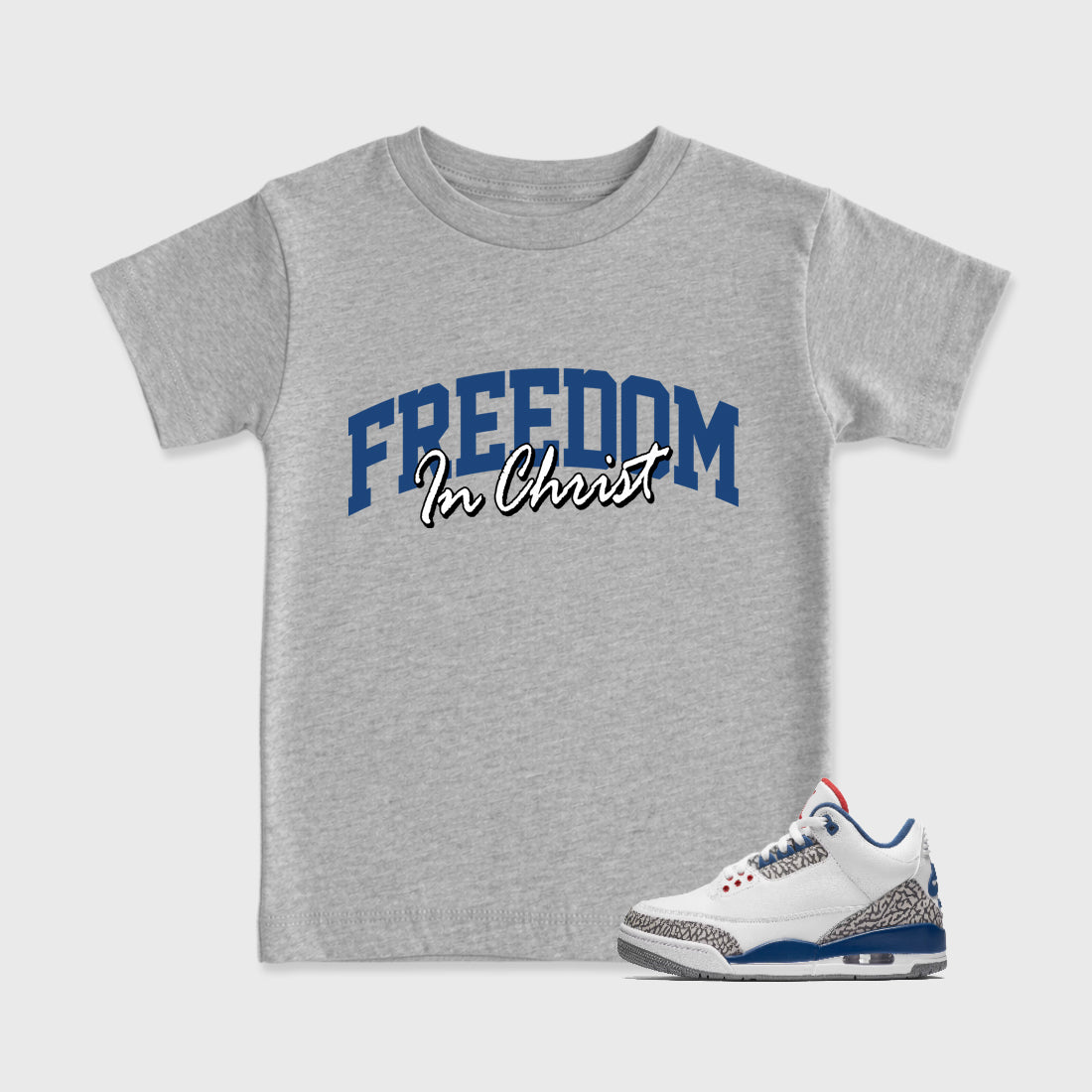 Freedom In Christ Baby & Kids Graphic T-Shirt featuring original artwork designed to match the Air Jordan 3 True Blue. Heather Grey 1 Kids Graphic Tee.