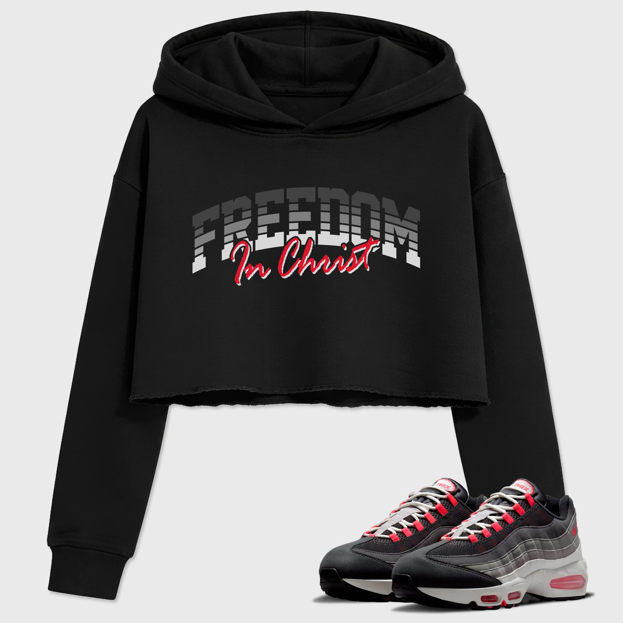 Freedom In Christ Women’s Graphic Crop Tee featuring original streetwear artwork designed to match the Air Max 95 Reverse Solar Red. Black 1 Crop Tee.