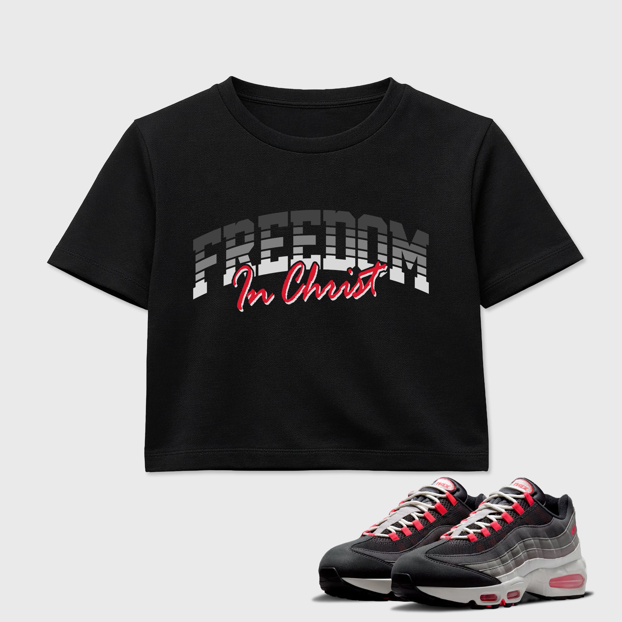 Freedom In Christ women’s crop tee designed to match the Air Max 95 Reverse Solar Red, featuring coordinated Black 1 options for a perfect streetwear vibe.
