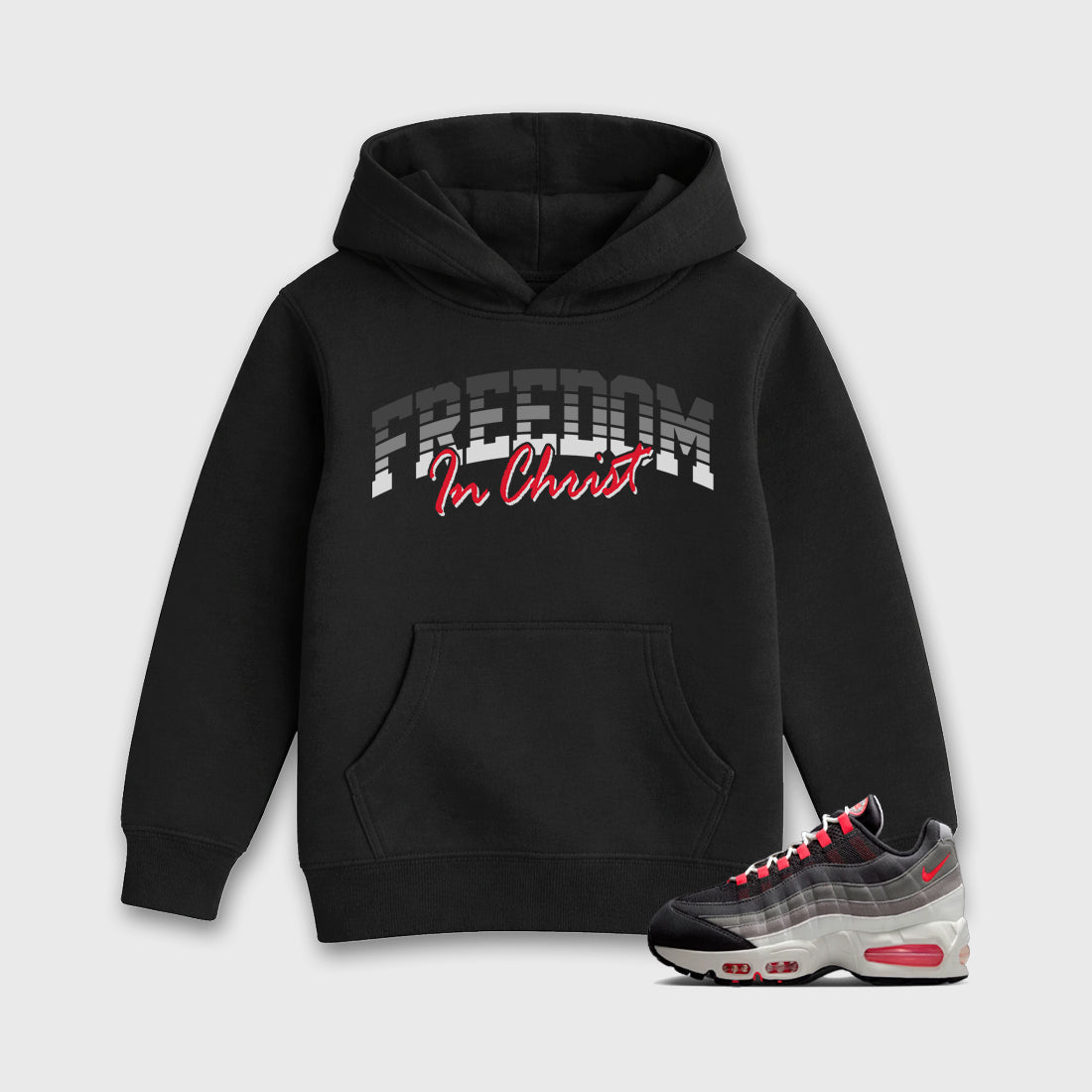 Freedom In Christ Baby & Kids Graphic Hoodie featuring original artwork designed to match the Air Max 95 Reverse Solar Red. Black 1 Kids Graphic Sweater.