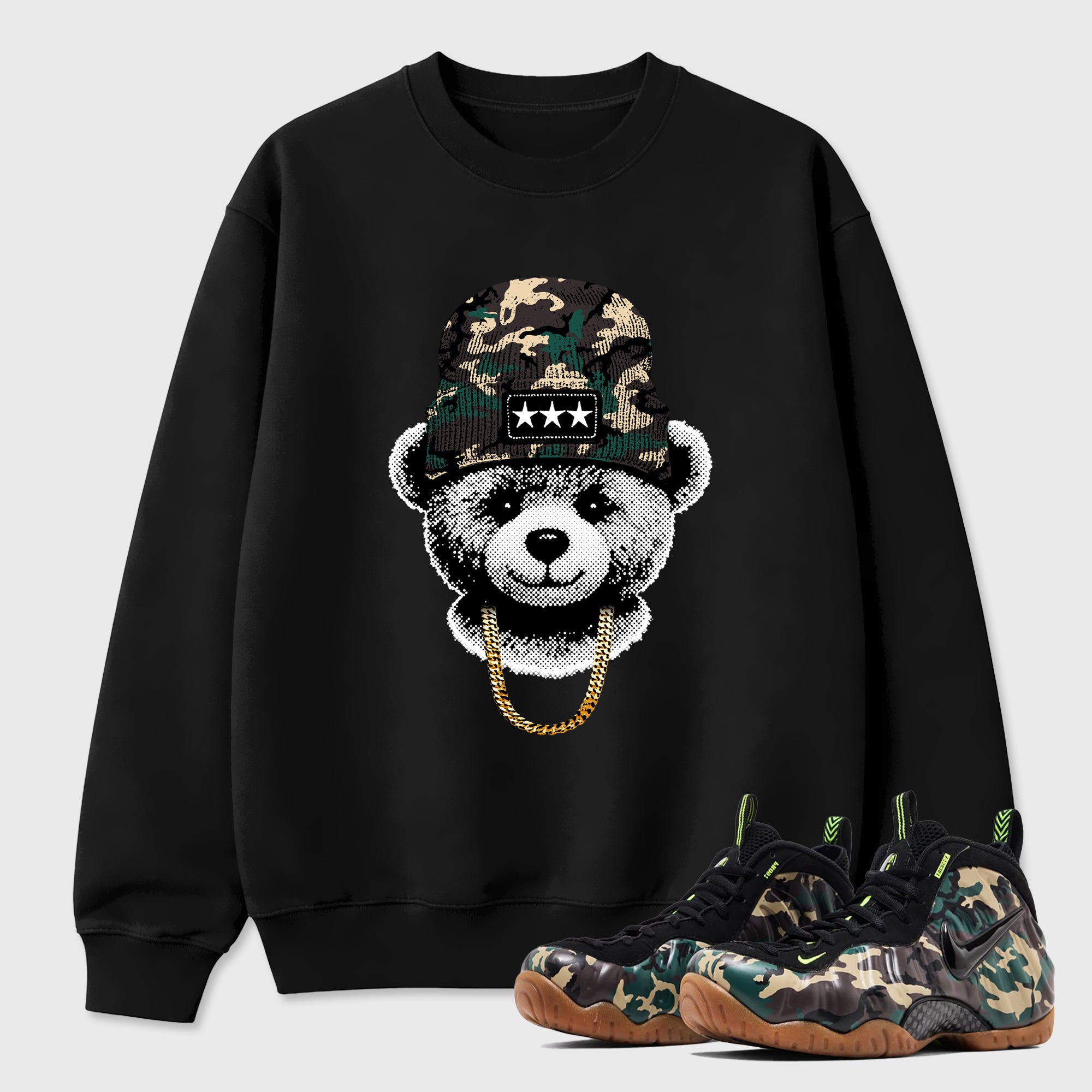 Gangster Teddy Graphic T-Shirt featuring original streetwear artwork designed to match the Air Foamposite Pro Green Camo. Black 1 Graphic Tee.