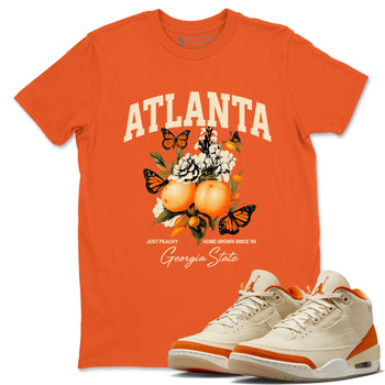 Georgia Peach sneaker match t-shirt styled to complete your fit with the Air Jordan 3 Starfish sneakers, shown in Orange 1.