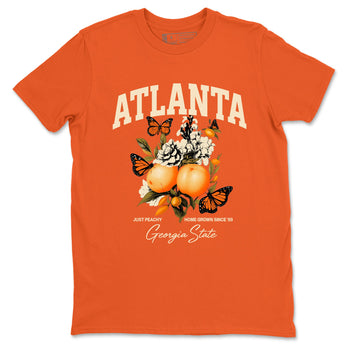 Georgia Peach sneaker match t-shirt styled to complete your fit with the Air Jordan 3 Starfish sneakers, shown in Orange 2.