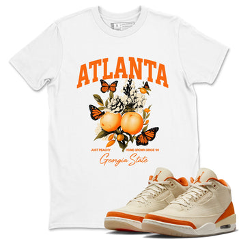 Georgia Peach sneaker match t-shirt styled to complete your fit with the Air Jordan 3 Starfish sneakers, shown in White 1.