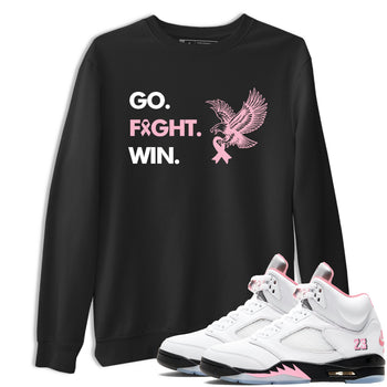 Sneaker Threads Sneaker Tees To Match Air Jordan 5 Medium Soft Pink Go Fight Win Graphic Tee Black 1. Perfect for Jordan releases 2025 colorways. breast cancer awareness.