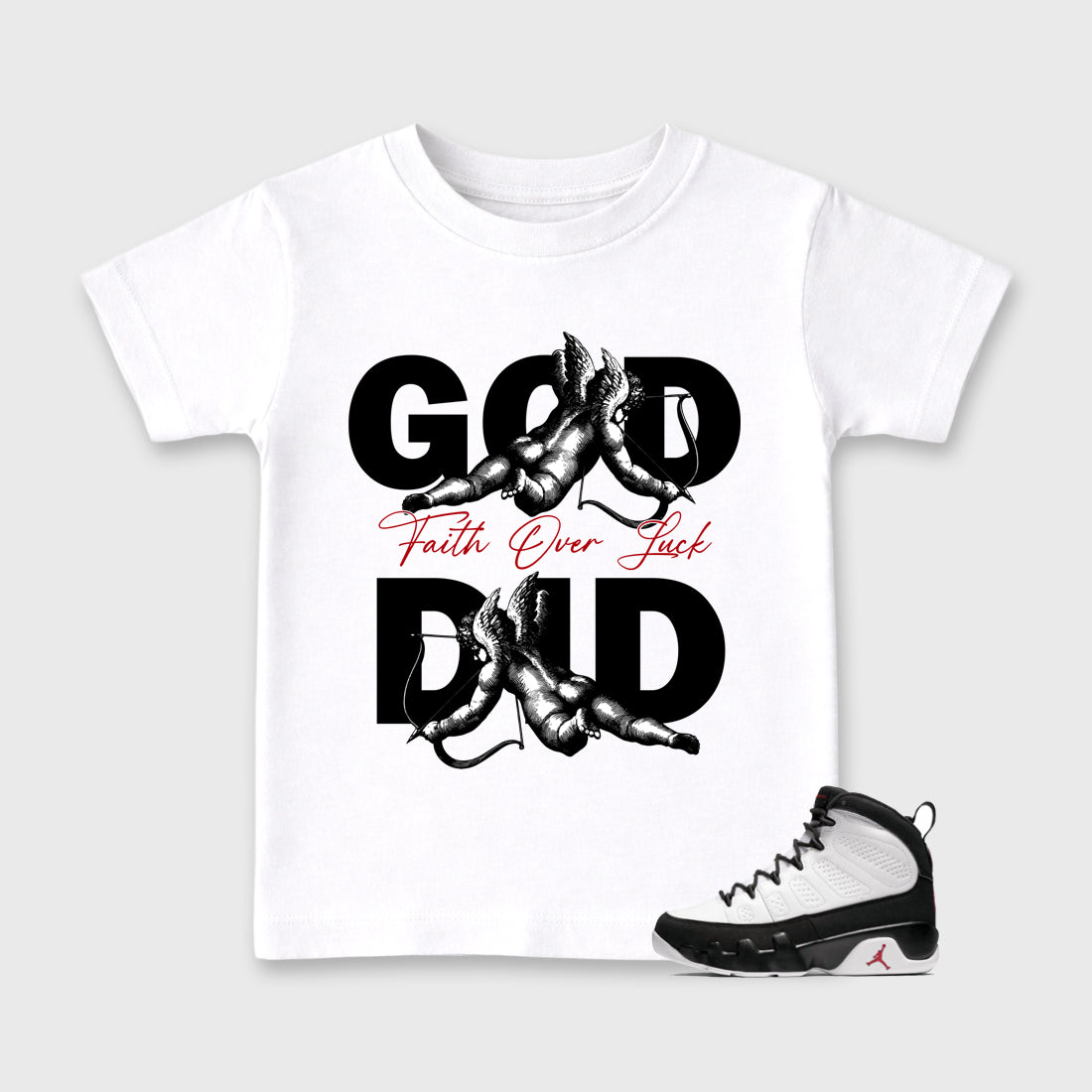 God Did Baby & Kids Graphic T-Shirt featuring original artwork designed to match the Air Jordan 9 True Red. White 1 Kids Graphic Tee.