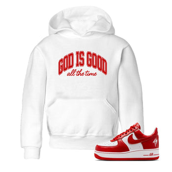 God Is Good baby and kids t-shirt crafted for little sneakerheads to shine with the Air Force 1 University Red sneakers, displayed in White 1.