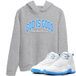 God Is Good sneaker match t-shirt styled to complete your fit with the Air Jordan 12 White and University Blue sneakers, shown in Heather Grey 1.