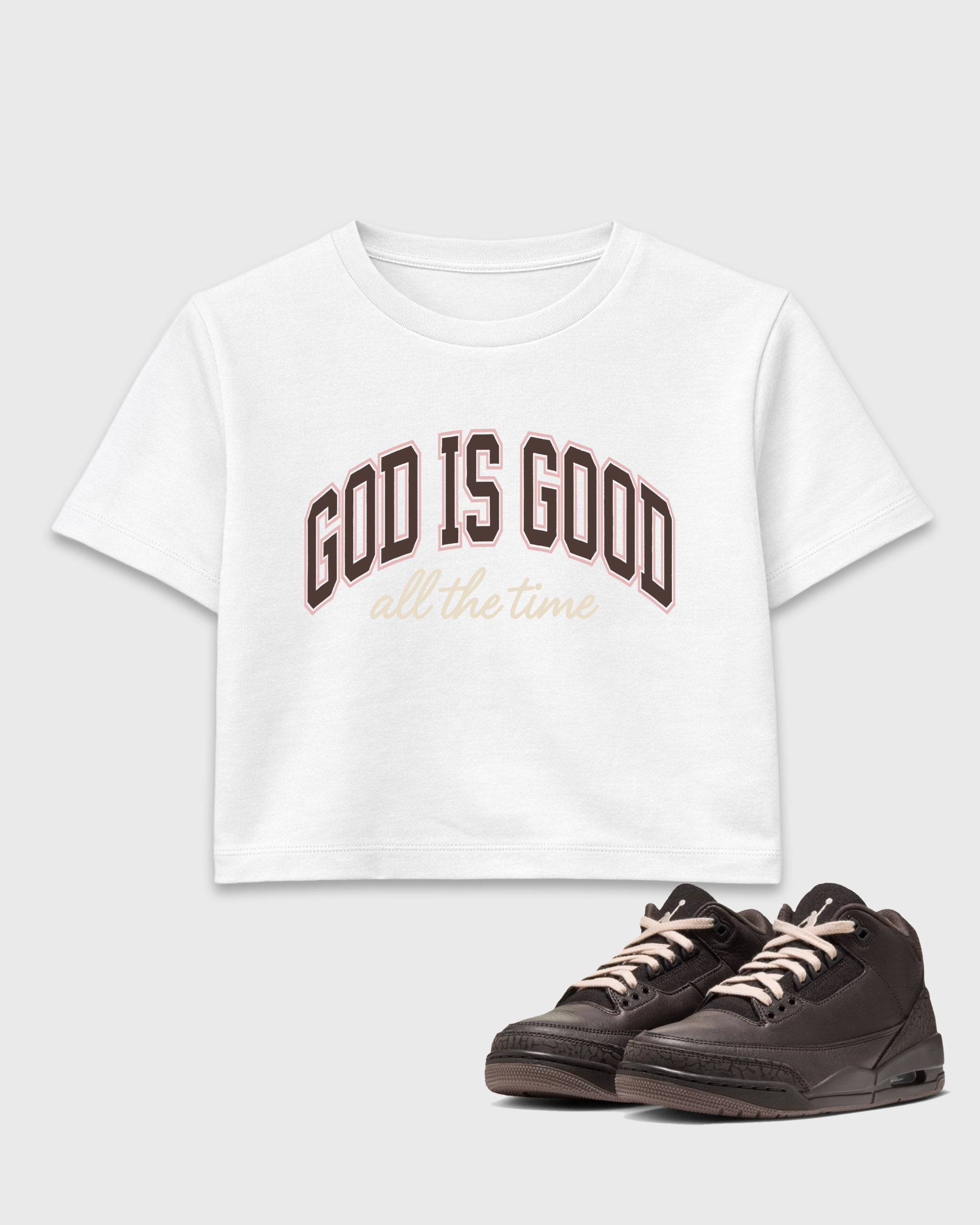 God Is Good women’s crop tee designed to match the Air Jordan 3 Fireside, featuring coordinated White 1 options for a perfect streetwear vibe.
