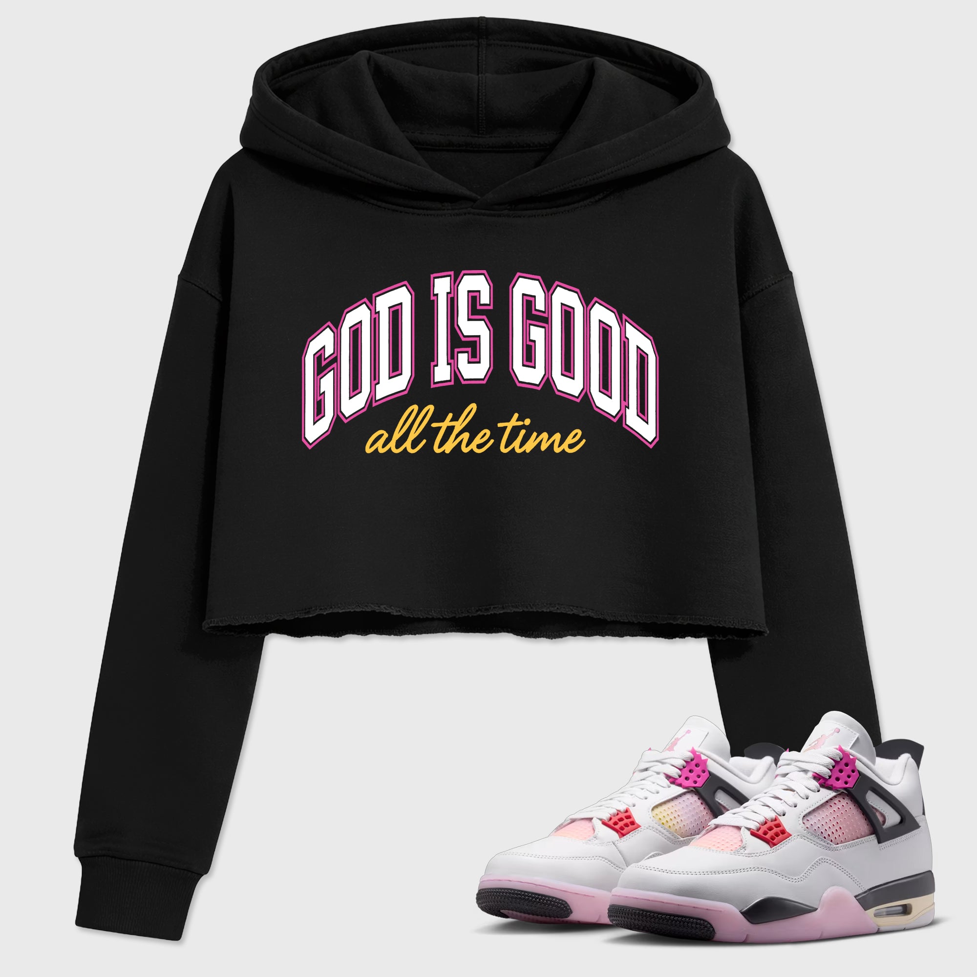 God Is Good Women’s Graphic Crop Tee featuring original streetwear artwork designed to match the Air Jordan 4 Comic. Black 1 Crop Tee.