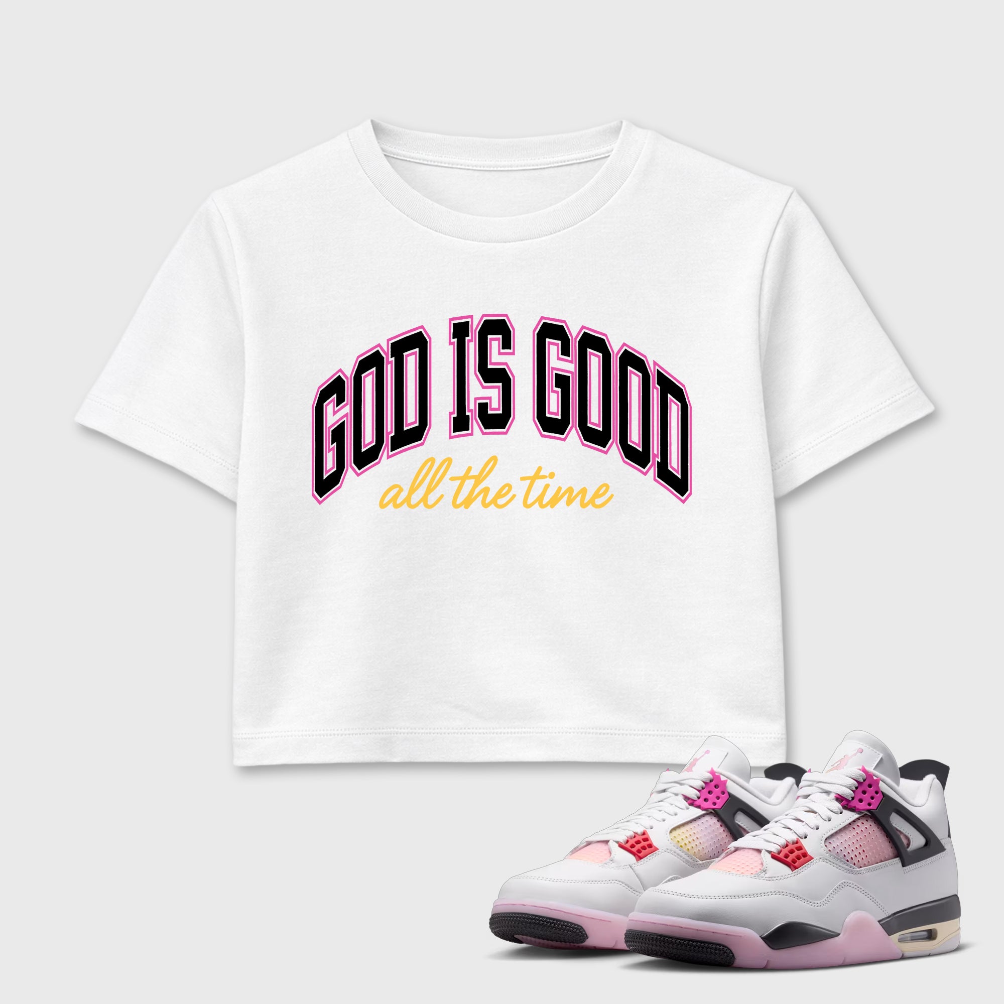 God Is Good women’s crop tee designed to match the Air Jordan 4 Comic, featuring coordinated White 1 options for a perfect streetwear vibe.