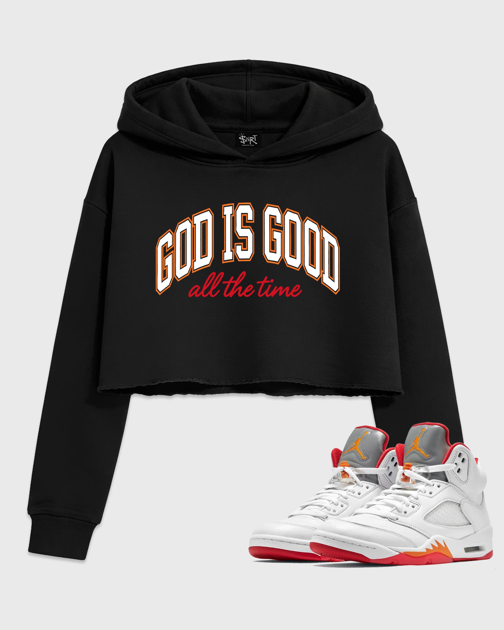 God Is Good Women’s Graphic Crop Tee featuring original streetwear artwork designed to match the Air Jordan 5 Sunset. Black 1 Crop Tee.