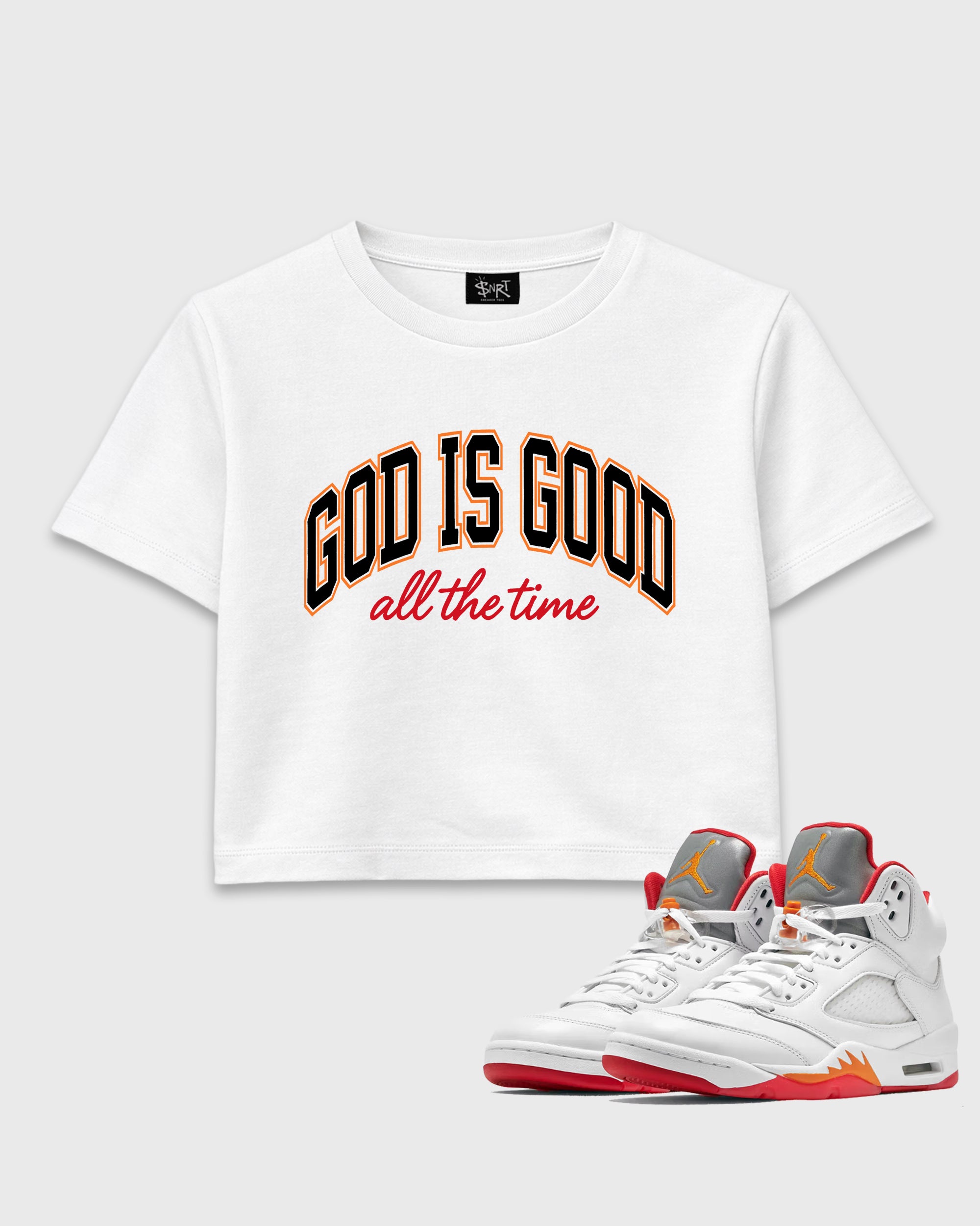 God Is Good women’s crop tee designed to match the Air Jordan 5 Sunset, featuring coordinated White 1 options for a perfect streetwear vibe.