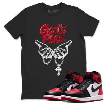 God's Plan sneaker match t-shirt styled to complete your fit with the Air Jordan 1 Ruby sneakers, shown in Black 1.