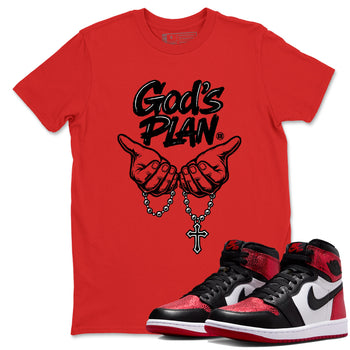 God's Plan sneaker match t-shirt styled to complete your fit with the Air Jordan 1 Ruby sneakers, shown in Red 1.