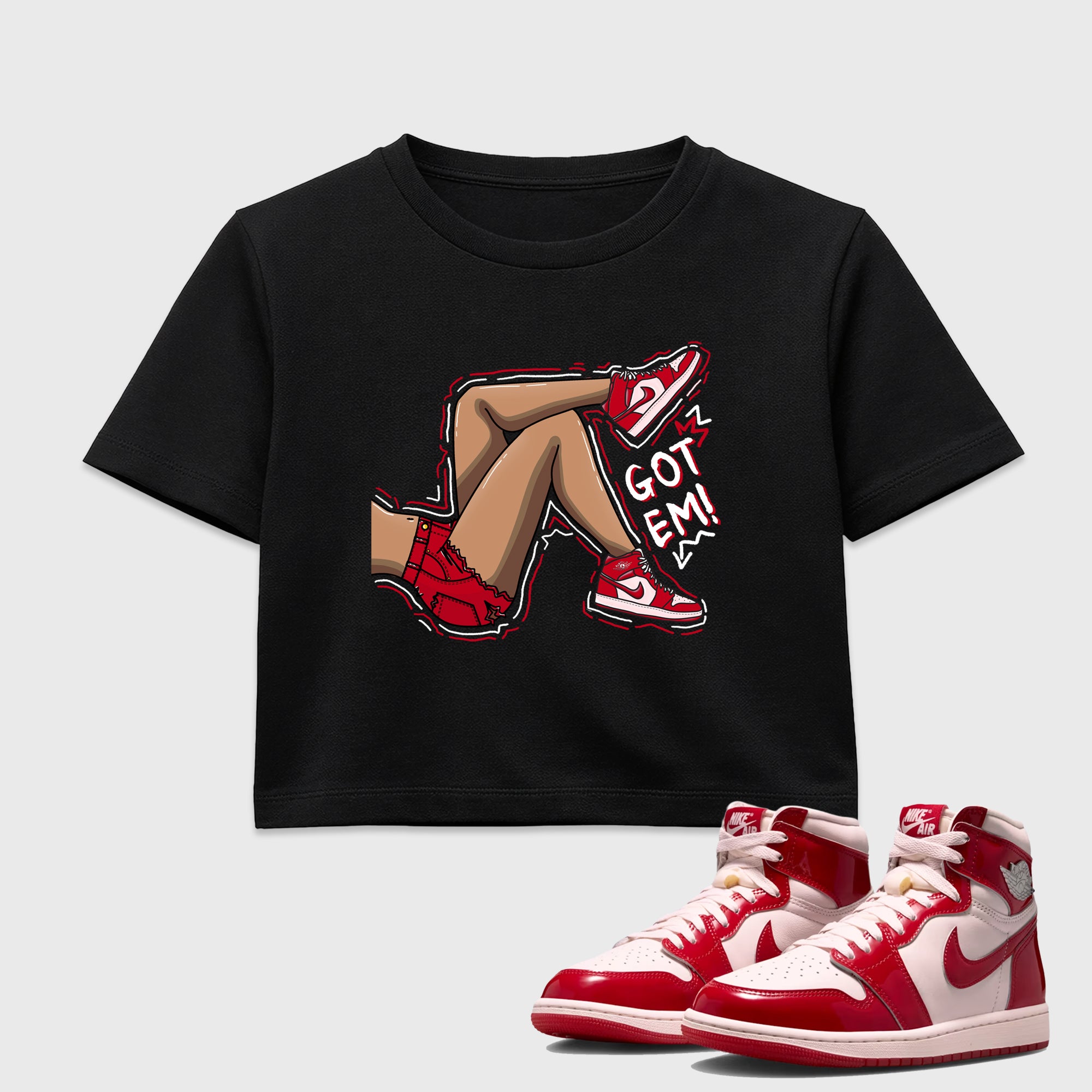 Got Em Legs women’s crop tee designed to match the Air Jordan 1 Nails and Grails, featuring coordinated Black 1 options for a perfect streetwear vibe.