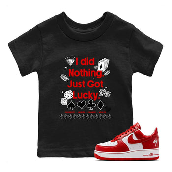 Got Lucky baby and kids t-shirt crafted for little sneakerheads to shine with the Air Force 1 University Red sneakers, displayed in Black 1.