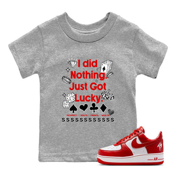 Got Lucky baby and kids t-shirt crafted for little sneakerheads to shine with the Air Force 1 University Red sneakers, displayed in Heather Grey 1.