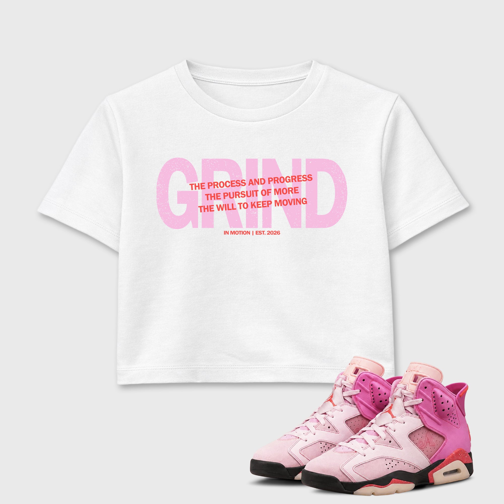 Grind In Motion women_ crop tee designed to match the Air Jordan 6 Playful Pink, featuring coordinated White 1 options for a perfect streetwear vibe.