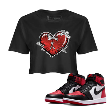 Heart With Ribbons womens crop tee made to vibe with the Air Jordan 1 Ruby sneakers — the perfect match in Black 1.