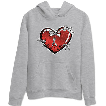 Heart With Ribbons sneaker match t-shirt styled to complete your fit with the Air Jordan 1 Ruby sneakers, shown in Heather Grey 2.