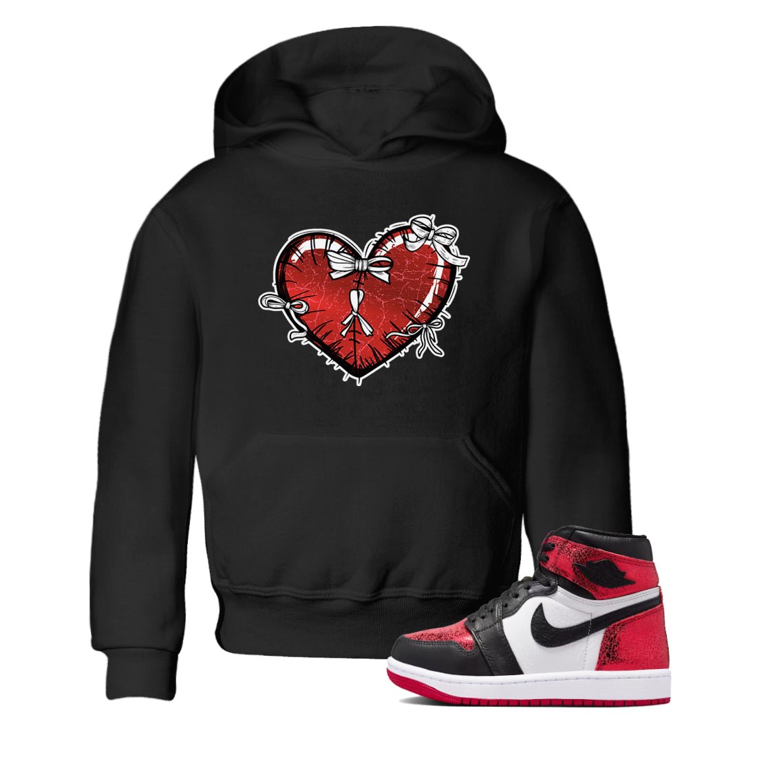 Heart With Ribbons baby and kids t-shirt crafted for little sneakerheads to shine with the Air Jordan 1 Ruby sneakers, displayed in Black 1.