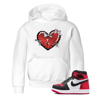 Heart With Ribbons baby and kids t-shirt crafted for little sneakerheads to shine with the Air Jordan 1 Ruby sneakers, displayed in White 1.