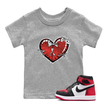 Heart With Ribbons baby and kids t-shirt crafted for little sneakerheads to shine with the Air Jordan 1 Ruby sneakers, displayed in Heather Grey 1.