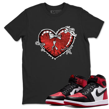 Heart With Ribbons sneaker match t-shirt styled to complete your fit with the Air Jordan 1 Ruby sneakers, shown in Black 1.