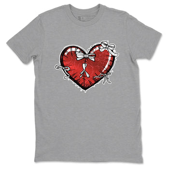 Heart With Ribbons sneaker match t-shirt styled to complete your fit with the Air Jordan 1 Ruby sneakers, shown in Heather Grey 2.