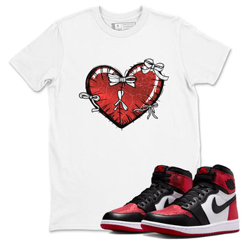 Heart With Ribbons sneaker match t-shirt styled to complete your fit with the Air Jordan 1 Ruby sneakers, shown in White 1.