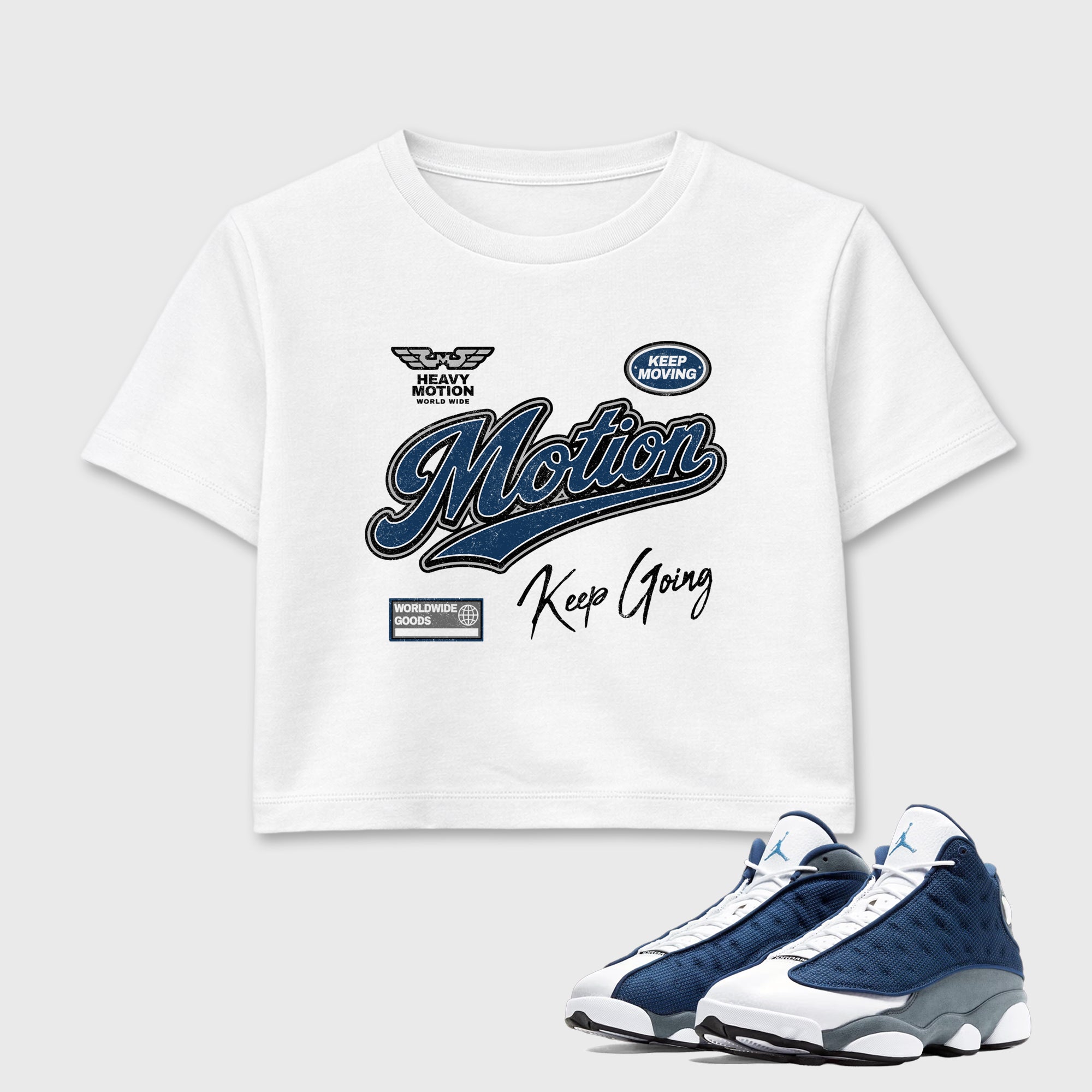Heavy Motion women’s crop tee designed to match the Air Jordan 13 Flint, featuring coordinated White 1 options for a perfect streetwear vibe.