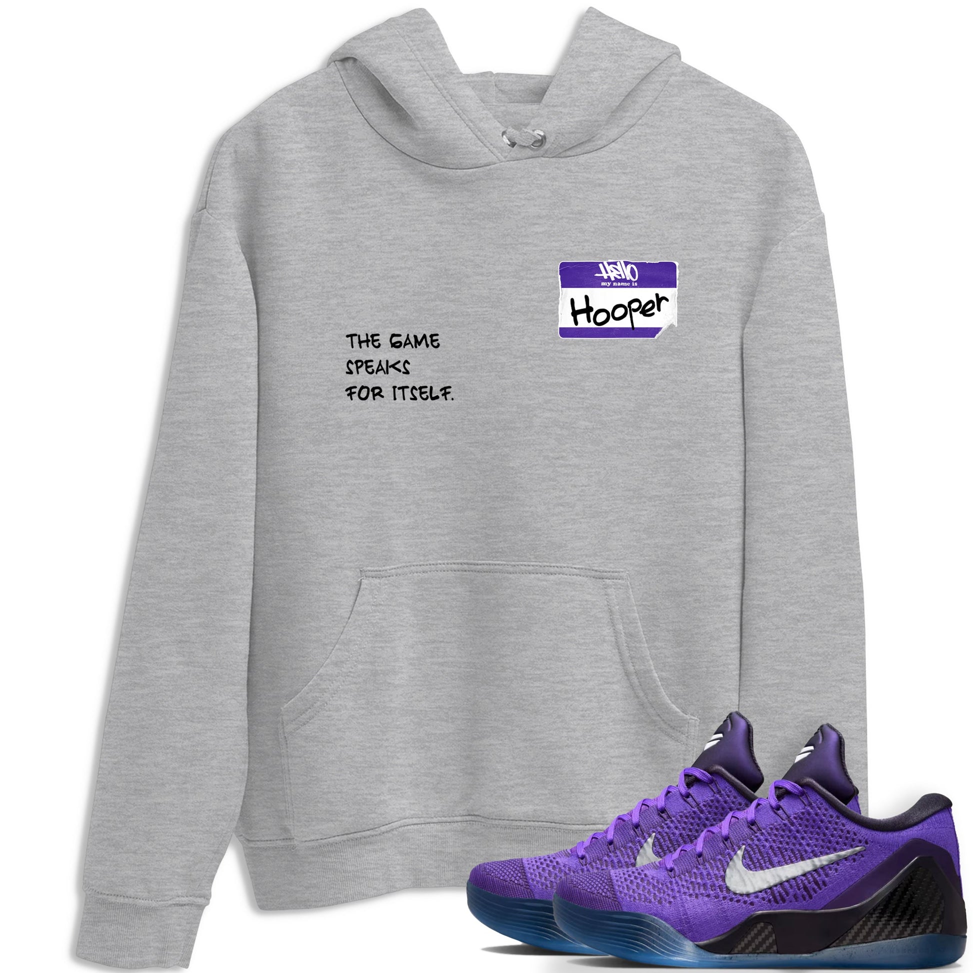 Sneaker Threads – Sneaker Tees To Match Nike KB 9 Hyper Grape – Hooper Badge Graphic Tee Heather Grey 1. Perfect for Jordan releases 2025 colorways. Perfect for purple basketball sneaker releases and legacy-inspired colorways for 2025 hoopers.