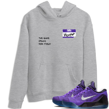 Sneaker Threads – Sneaker Tees To Match Nike KB 9 Hyper Grape – Hooper Badge Graphic Tee Heather Grey 1. Perfect for Jordan releases 2025 colorways. Perfect for purple basketball sneaker releases and legacy-inspired colorways for 2025 hoopers.