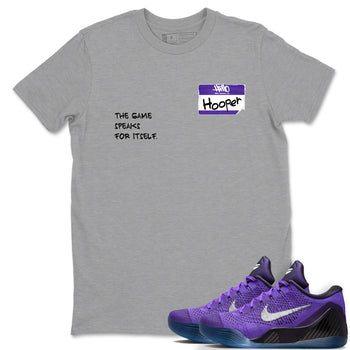 Sneaker Threads – Sneaker Tees To Match Nike KB 9 Hyper Grape – Hooper Badge Graphic Tee Heather Grey 1. Perfect for Jordan releases 2025 colorways. Perfect for purple basketball sneaker releases and legacy-inspired colorways for 2025 hoopers.