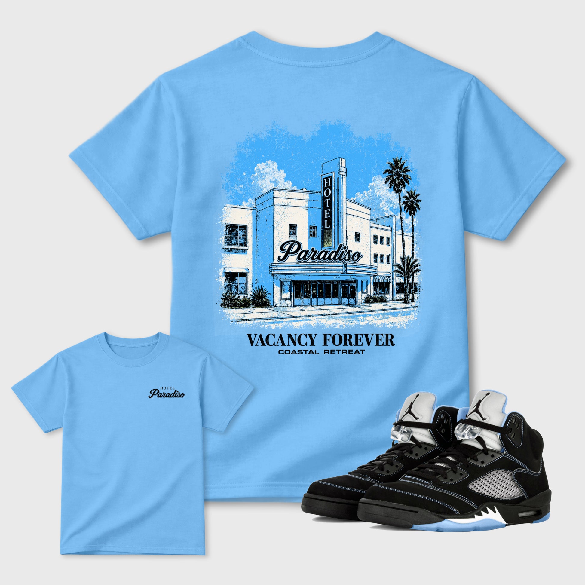 Hotel Paradiso Graphic T-Shirt sneaker match tee designed for the 5s Black Carolina, featuring coordinated color options for a perfect streetwear match. Carolina Blue shirt.