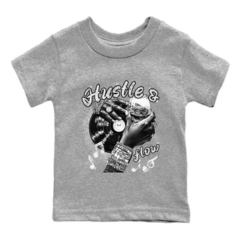 Hustle And Flow baby and kids t-shirt crafted for little sneakerheads to shine with the Air Foamposite One Triple White sneakers, displayed in Heather Grey 2.