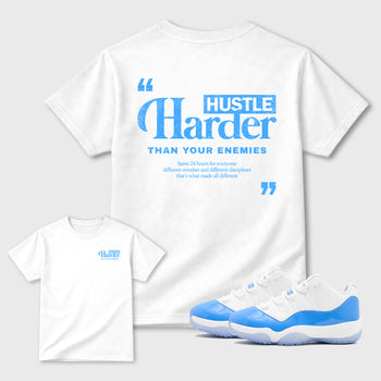 Hustle Harder Than Your Enemiesgraphic t-shirt. Streetwear sneakerfit. Sneaker outfit. Complete your fit with the Air Jordan 11 University Blue sneakers, shown in White.