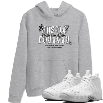 Hustle Over Haters sneaker match t-shirt styled to complete your fit with the Air Foamposite One Triple White sneakers, shown in Heather Grey 1.