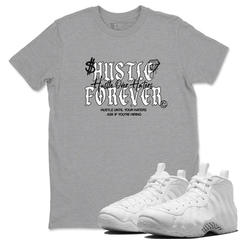 Hustle Over Haters sneaker match t-shirt styled to complete your fit with the Air Foamposite One Triple White sneakers, shown in Heather Grey 1.