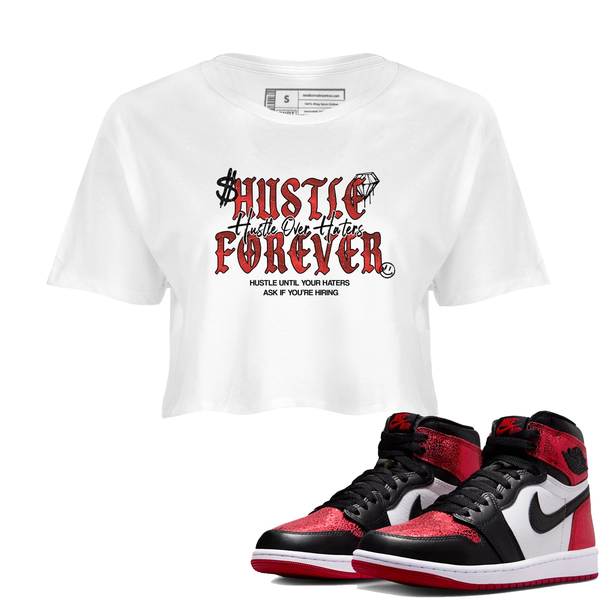 Hustle Over haters womens crop tee made to vibe with the Air Jordan 1 Ruby sneakers — the perfect match in White 1.