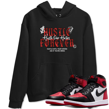 Hustle Over haters sneaker match t-shirt styled to complete your fit with the Air Jordan 1 Ruby sneakers, shown in Black 1.
