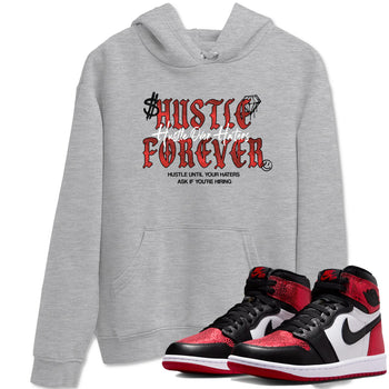 Hustle Over haters sneaker match t-shirt styled to complete your fit with the Air Jordan 1 Ruby sneakers, shown in Heather Grey 1.