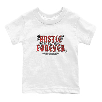 Hustle Over haters baby and kids t-shirt crafted for little sneakerheads to shine with the Air Jordan 1 Ruby sneakers, displayed in White 2.