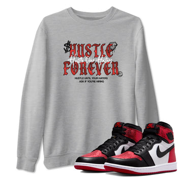 Hustle Over haters sneaker match t-shirt styled to complete your fit with the Air Jordan 1 Ruby sneakers, shown in Heather Grey 1.
