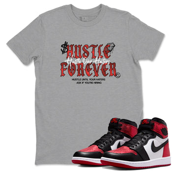 Hustle Over haters sneaker match t-shirt styled to complete your fit with the Air Jordan 1 Ruby sneakers, shown in Heather Grey 1.